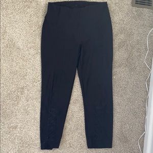 vogo pair of black leggings with crosses